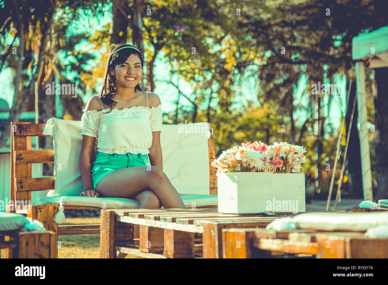 Girl modeling with flowers bouquet Stock Photo Alamy