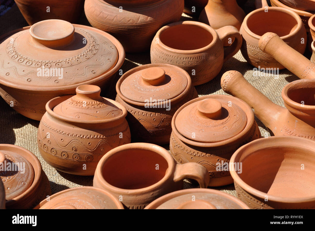 Lots of traditional ukrainian handmade clay pottery production, vertical  composition Stock Photo - Alamy