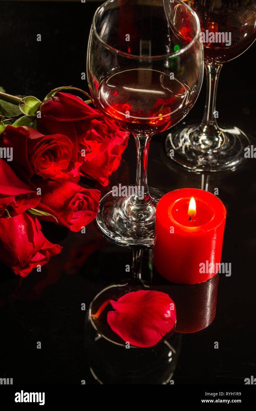 Red wine and roses Stock Photo - Alamy