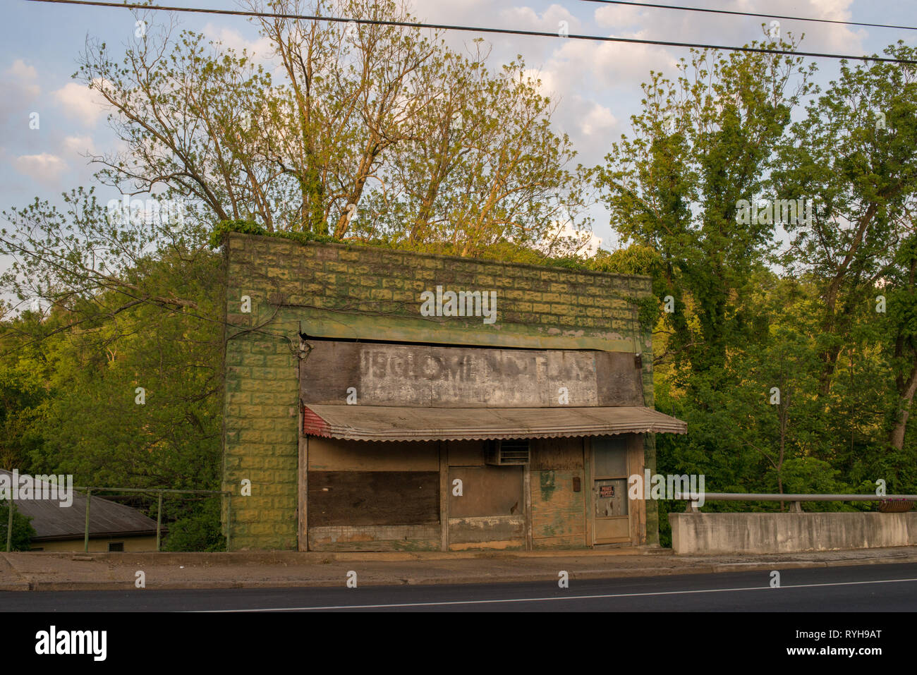 Abandoned, overgrown buildings in Newport, Cocke County, Tennessee, USA