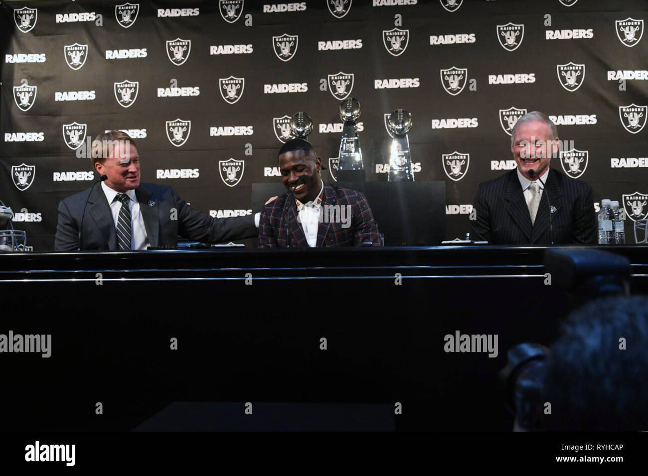 Alameda, United States. 13th Mar, 2019. Mar 13, 2019; Alameda, CA, USA;  Oakland Raiders receiver Antonio Brown is introduced at a press conference  at the Raiders practice facility. From right: Raiders coach