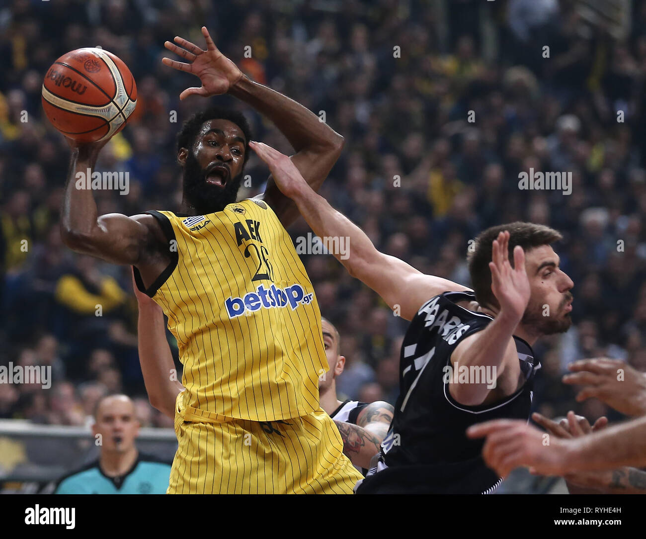 Athens, Greece. 13th Mar, 2019. Howard Sant-Roos (L) of AEK Athens competes  with Milenco Tepic of PAOK Thessaloniki during the 1/8 finals second leg at  Basketball Champions League tournament in Athens, Greece,