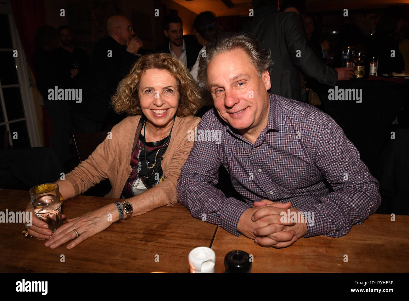 13 March 2019, Bavaria, München: The actress Michaela May and the director Andi Niessner celebrate at the After Work Party of the production company ndf in the Parkcafe. Photo: Felix Hörhager/dpa Stock Photo
