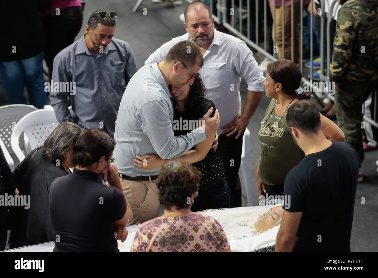 Suzano, Brazil. 14th Mar, 2019. SP - Sao Paulo - 03/14/2019 - Attack at Suzano School Velorio das Vitimas - It happens at the Max Feffer Arena in Suzano in Greater Sao Paulo, the wake of the victims of the Raul Brasil State School attack, where 2 shooters ex school opened fire killing 5 students and 2 officials, leaving about 11 injured, then one of the marksmen killed the other and the same committed suicide. The river is expected to continue until 4 pm. Photo: Marcello Zambrana/AGIF Credit: AGIF/Alamy Live News Stock Photo