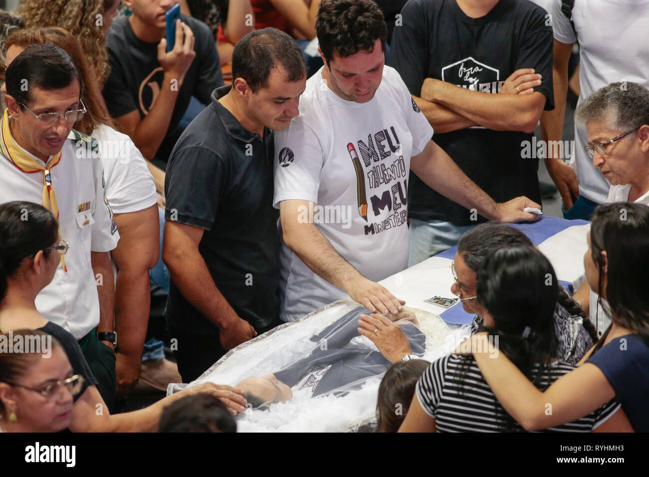 Suzano, Brazil. 14th Mar, 2019. SP - Suzano - 03/14/2019 - Attack at Suzano School Velorio das Vitimas - It happens at the Max Feffer Arena in Suzano in Greater Sao Paulo, the wake of the victims of the Raul Brasil State School attack, where 2 shooters ex students from the school opened fire killing 5 students and 2 officials, leaving about 11 wounded, then one of the marksmen killed the other and the same committed suicide. The river is expected to continue until 4 pm. Photo: Marcello Zambrana/AGIF Credit: AGIF/Alamy Live News Stock Photo