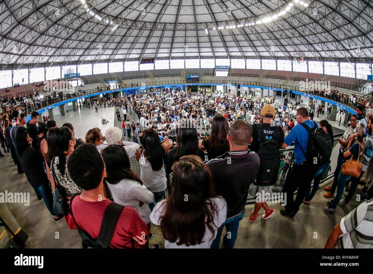 Suzano, Brazil. 14th Mar, 2019. SP - Suzano - 03/14/2019 - Attack at Suzano School Velorio das Vitimas - It happens at the Max Feffer Arena in Suzano in Greater Sao Paulo, the wake of the victims of the Raul Brasil State School attack, where 2 shooters ex students from the school opened fire killing 5 students and 2 officials, leaving about 11 wounded, then one of the marksmen killed the other and the same committed suicide. The river is expected to continue until 4 pm. Photo: Marcello Zambrana/AGIF Credit: AGIF/Alamy Live News Stock Photo