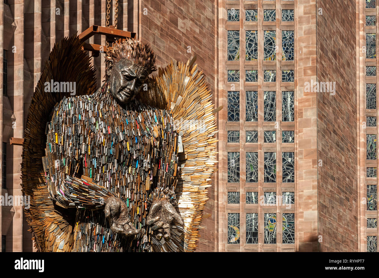 Coventry, West Midlands, UK. 14th March, 2019.  The Knife Angel, which is made up of 100,000 knives which were handed into police forces around the country, was erected outside Coventry Cathedral today. The Knife Angel is a 27 foot high sculpture composed of knives by the artist Alfie Bradley as a physical reminder of the effects of violence and aggression. It is in Coventry until 23rd April. Credit: AG News/Alamy Live News. Stock Photo