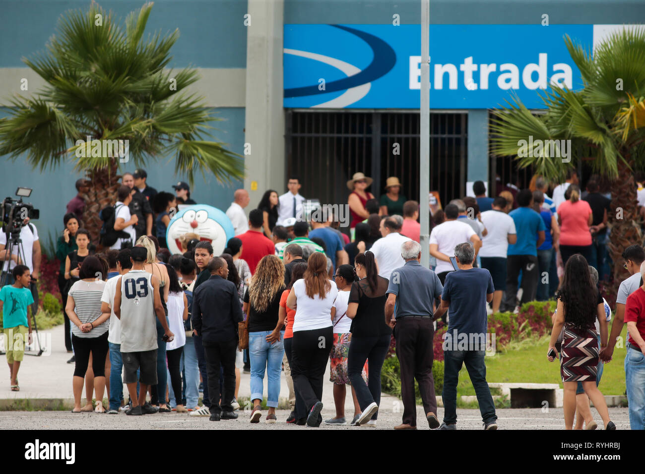 Sao Paulo, Brazil. 14th Mar 2019.  Attack at Suzano School Velorio das Vitimas - It happens at the Max Feffer Arena in Suzano in Greater Sao Paulo, the wake of the victims of the Raul Brasil State School attack, where 2 shooters ex students from the school opened fire killing 5 students and 2 officials, leaving about 11 wounded, then one of the marksmen killed the other and the same committed suicide. The river is expected to continue until 4 pm. Photo: Marcello Zambrana / AGIF Credit: AGIF/Alamy Live News Stock Photo