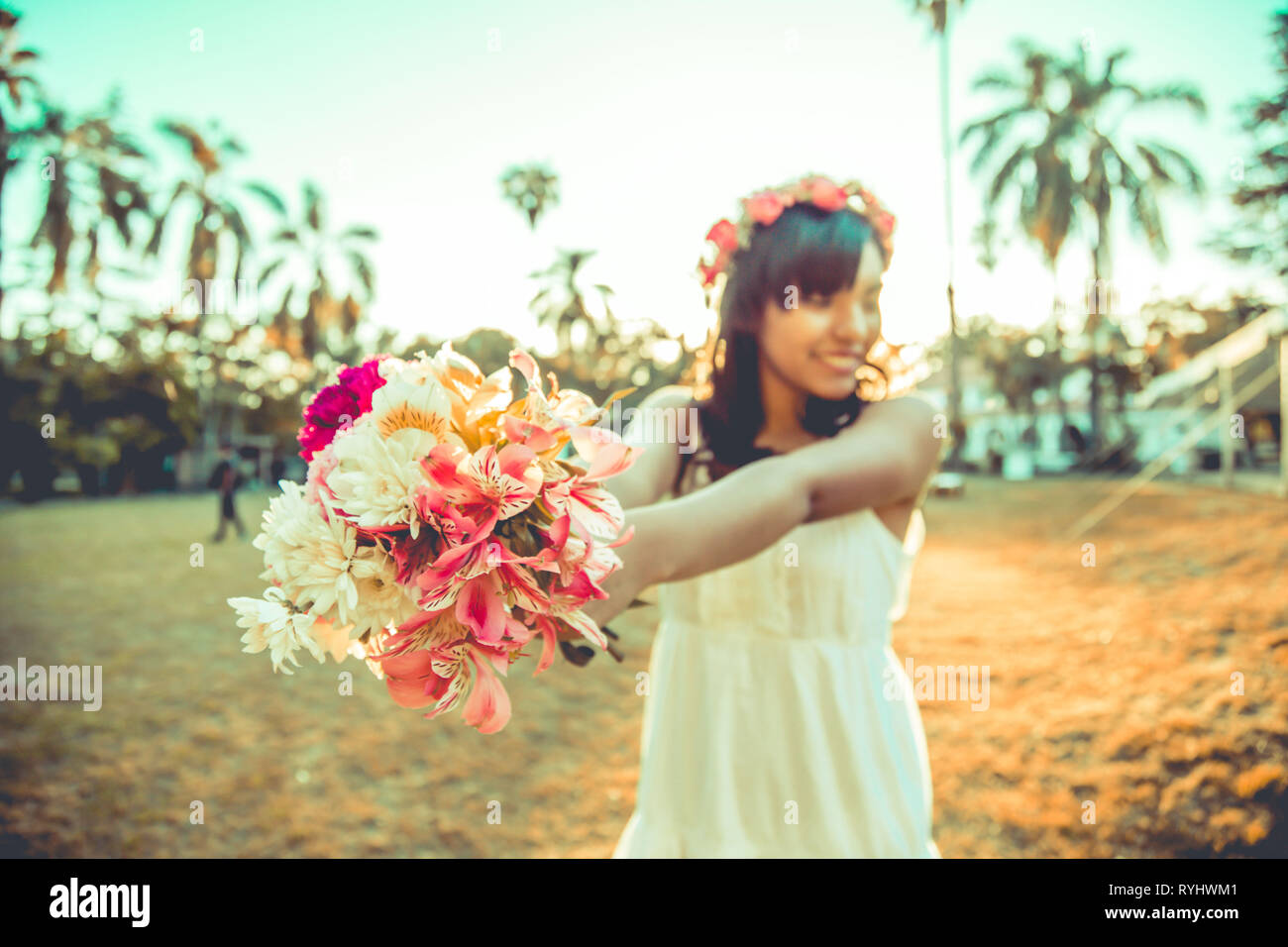 Girl modeling with flowers bouquet Stock Photo Alamy