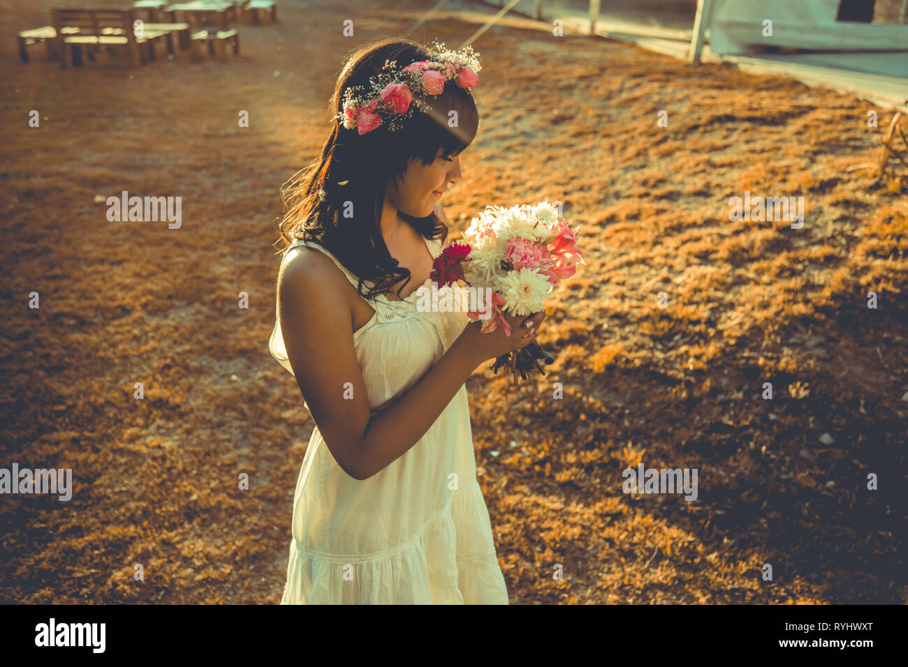 Girl modeling with flowers bouquet Stock Photo