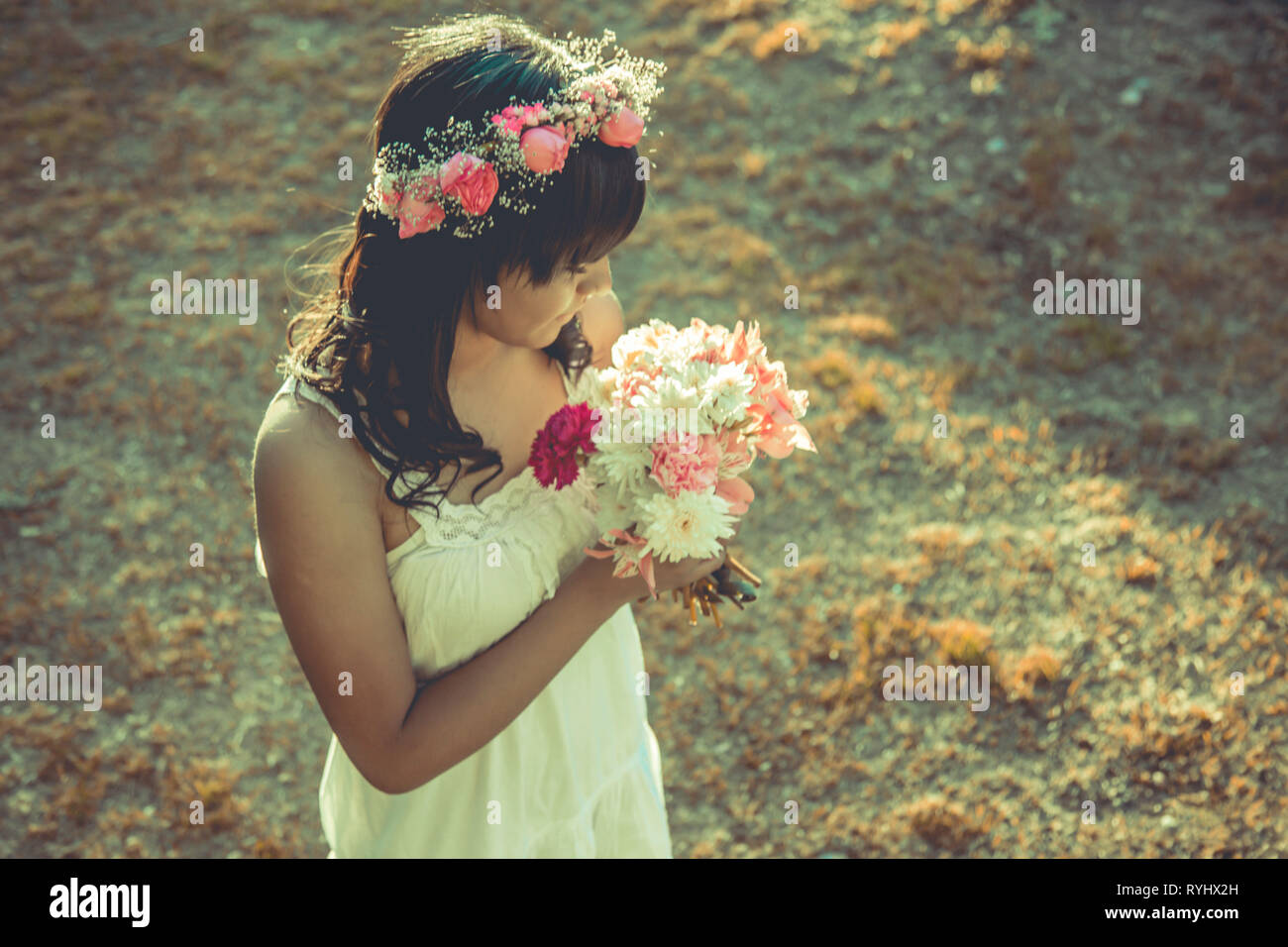 Girl modeling with flowers bouquet Stock Photo Alamy