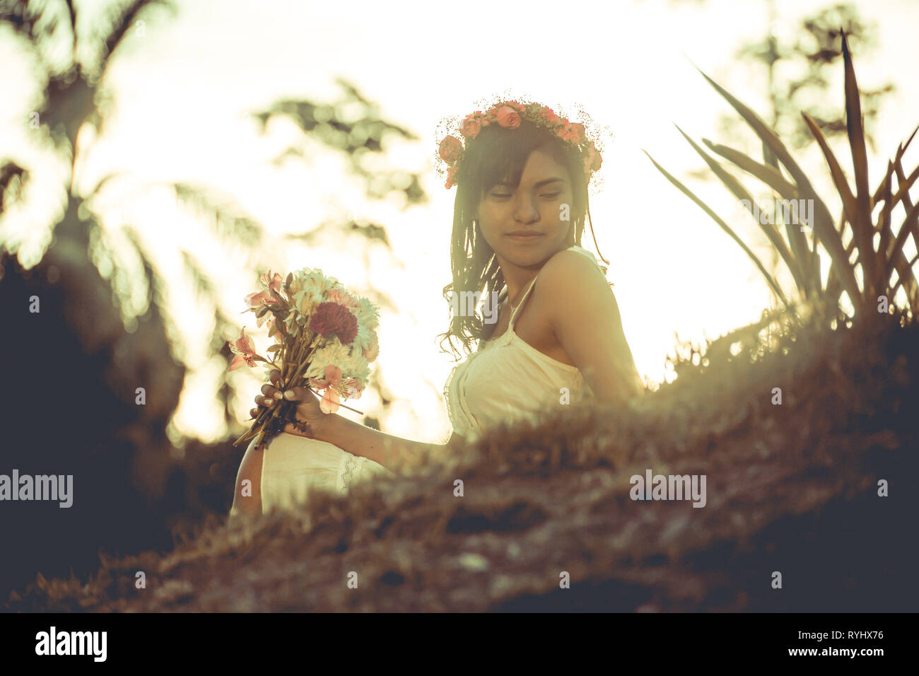 Girl modeling with flowers bouquet Stock Photo Alamy