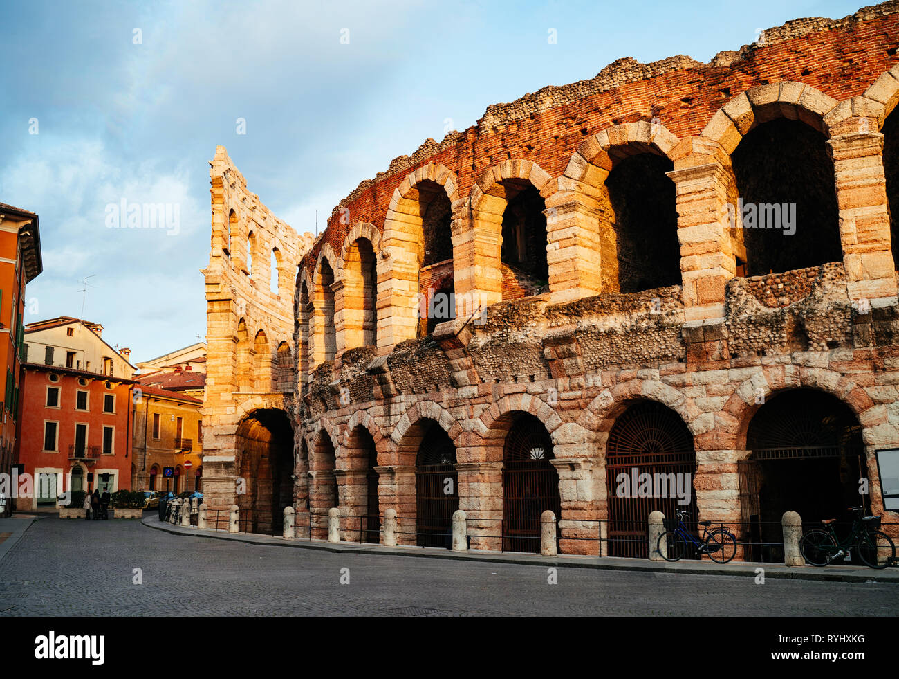 Piazza Bra and Roman Arena in Verona at dusk time, Italy Stock Photo