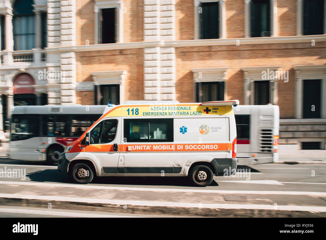 Rome, Italy - October 20, 2018: Moving With Siren Emergency Ambulance Reanimation Van Car On Street. Emergency Lights System Els Activated Stock Photo