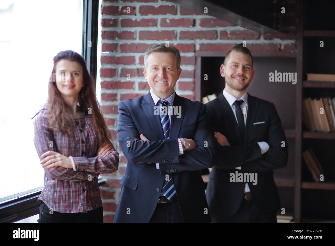 group of business people standing in modern office Stock Photo - Alamy