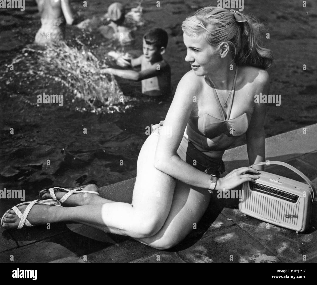 broadcast, radio, radio sets, Telefunken Bajazzo 3091, a young woman with the radio in the lido, Germany, 1960, Additional-Rights-Clearance-Info-Not-Available Stock Photo