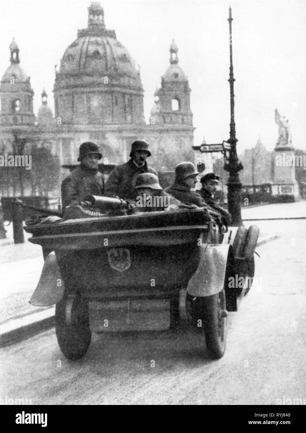 Revolution, 1918 - 1919, Germany, Berlin, government forces with car, Unter den Linden in front of the Schlossbruecke, machine gun, machine guns, machine-gun, military, soldiers, soldier, armed forces, Berlin cathedral, church, churches, German Revolution of 1918-1919, bridge, bridges, street, streets, German Reich, republic, republics, Free State of Prussia, 1910s, 10s, 20th century, people, men, man, male, group, groups, revolution, revolutions, government forces, government troops, car, cars, historic, historical, Additional-Rights-Clearance-Info-Not-Available Stock Photo