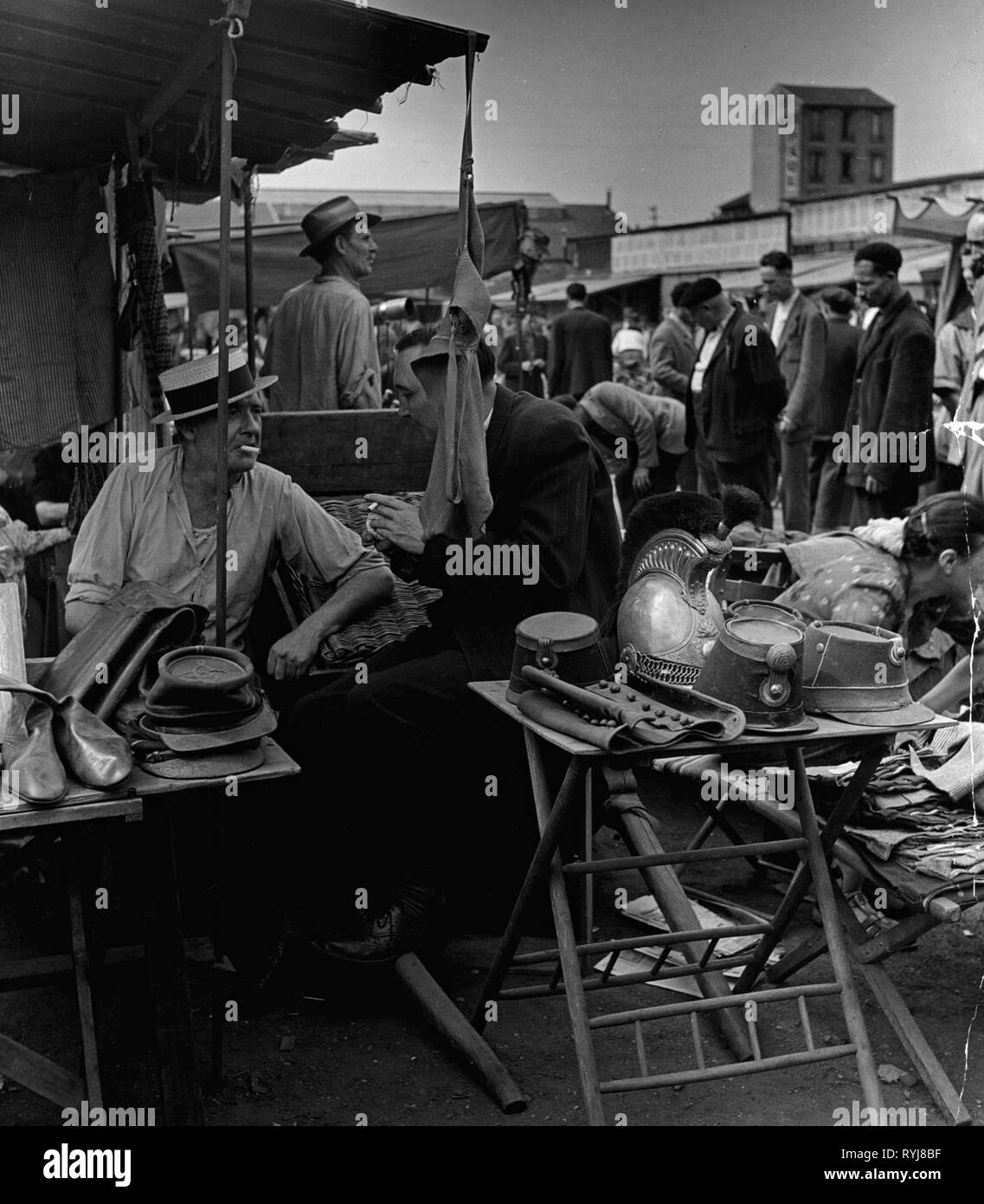 trade, markets, traffic, merchant with militaria on flea market, Spain, 1950s, Additional-Rights-Clearance-Info-Not-Available Stock Photo