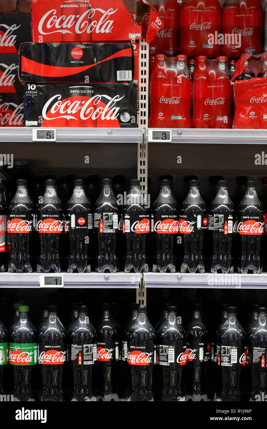 Stalls in row at supermarket. Soft drinks. Coca Cola. France Stock