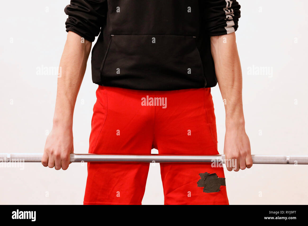 Man lifting weights in gym. France Stock Photo Alamy