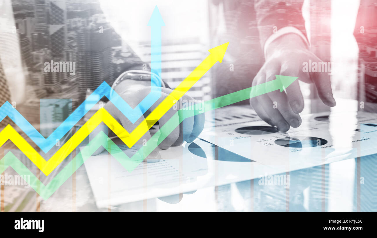 Financial growth arrows graph. Investment and trading concept. Stock Photo