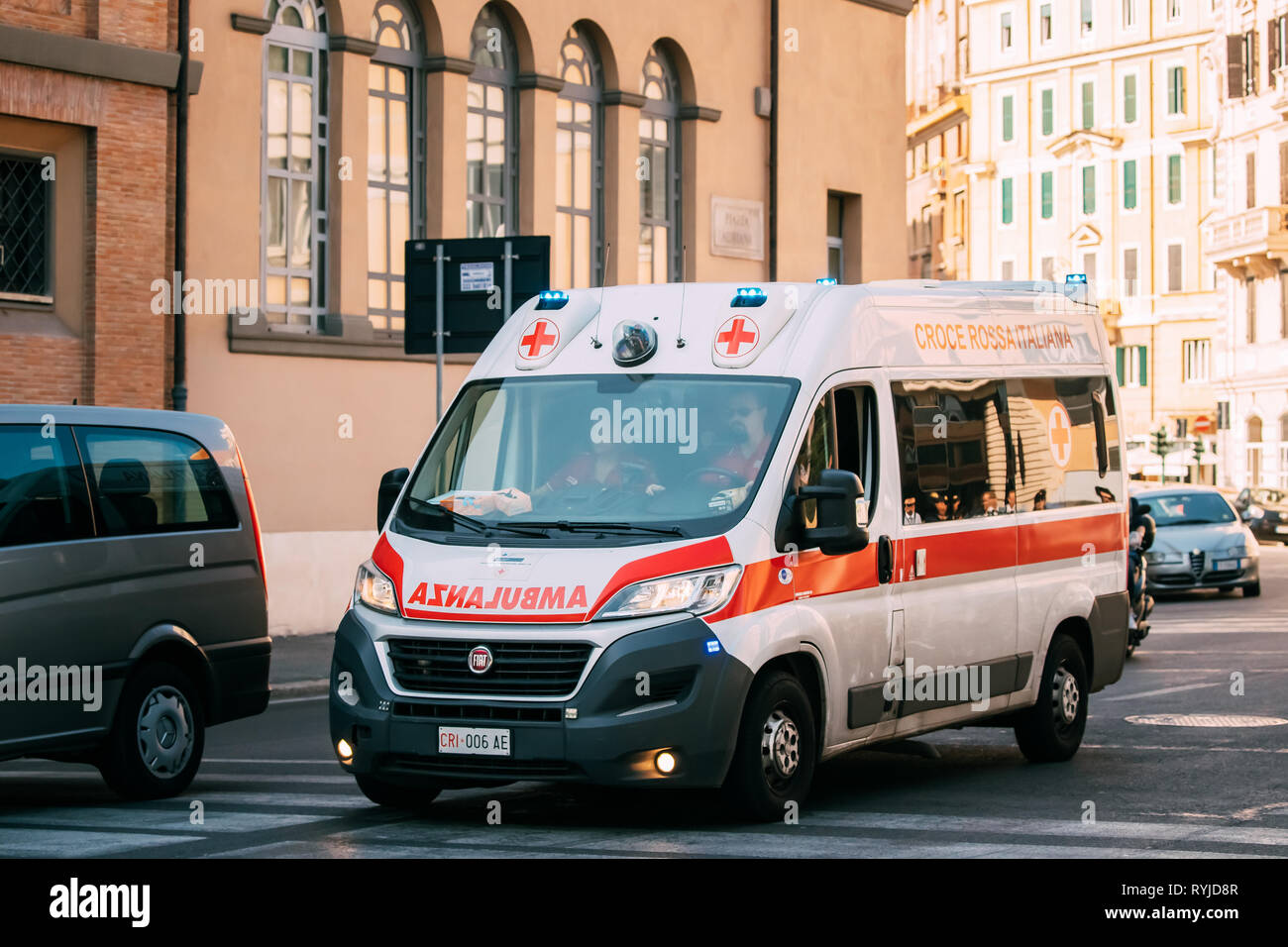 Rome, Italy - October 20, 2018: Moving With Siren Emergency Ambulance Reanimation Van Fiat Car On Street. Emergency Lights System Els Activated Stock Photo