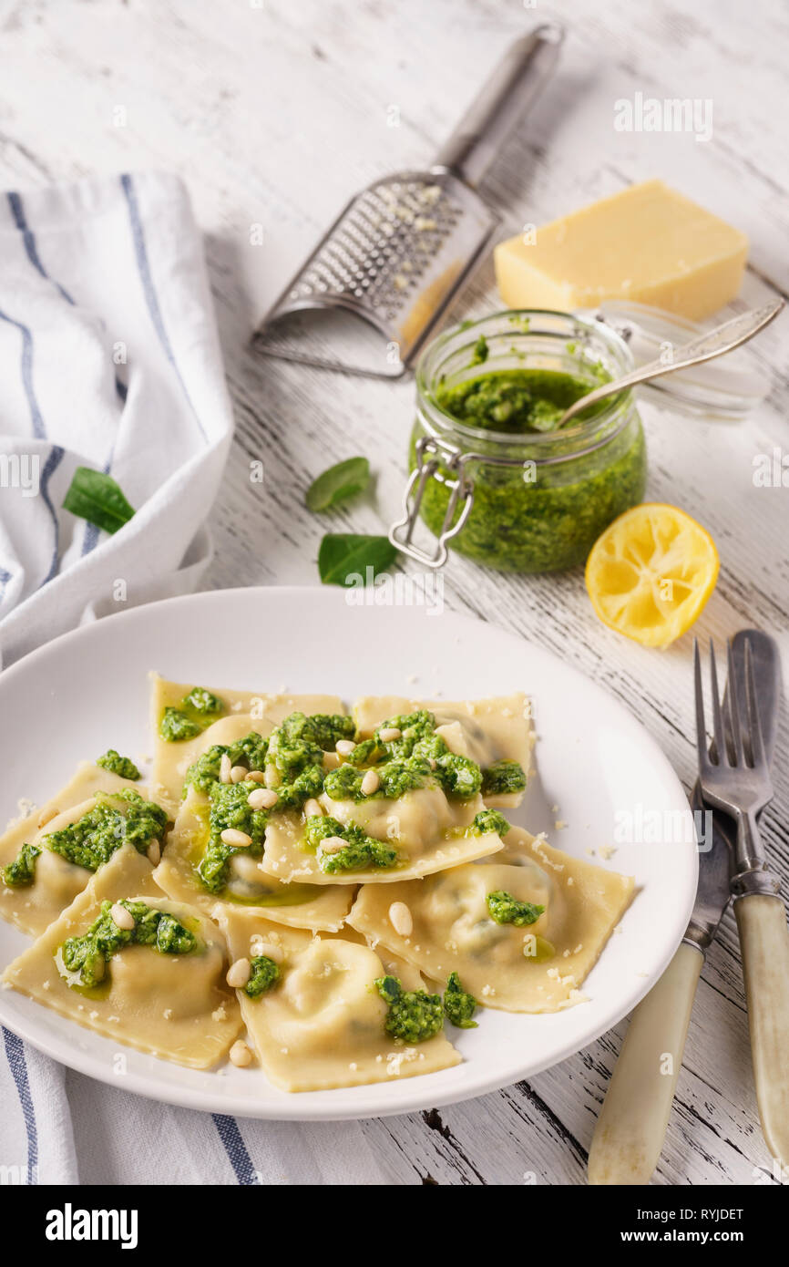 Italian spinach ravioli with pesto sauce, parmesan and cedar nuts Stock ...