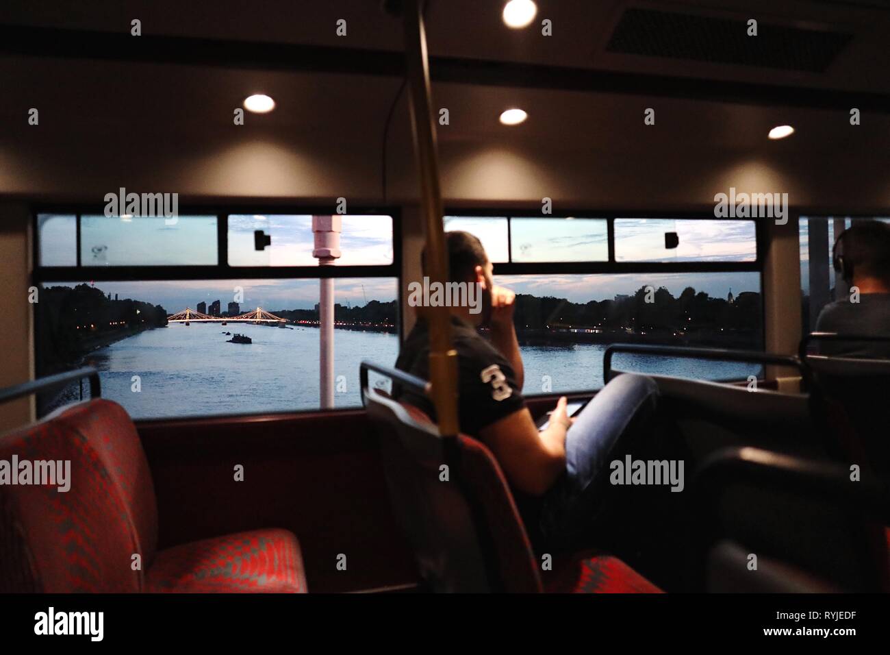 View from the window of a bus on the river Thames, London, UK Stock Photo
