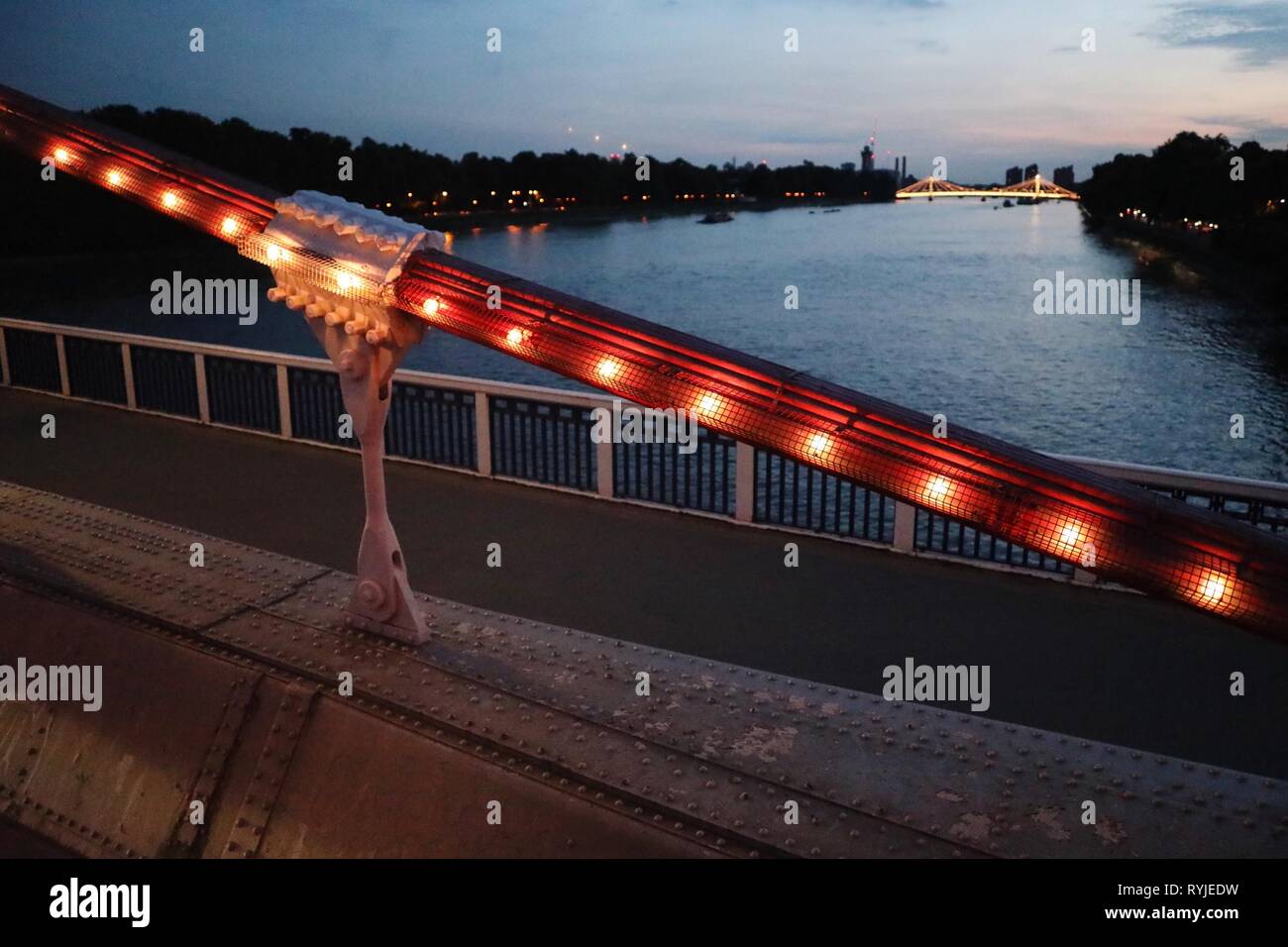 Chelsea bridge at night in London ,UK Stock Photo