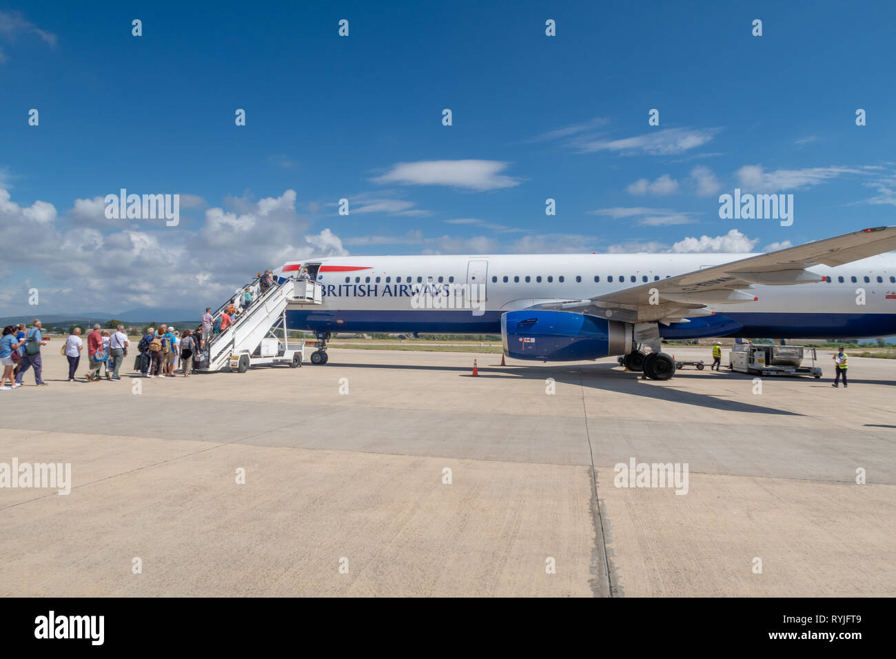 PREVEZA, GREECE - JUNE 10 2018: Passengers boarding  a British Airways airplane on Preveza airport tarmac in Greece Stock Photo