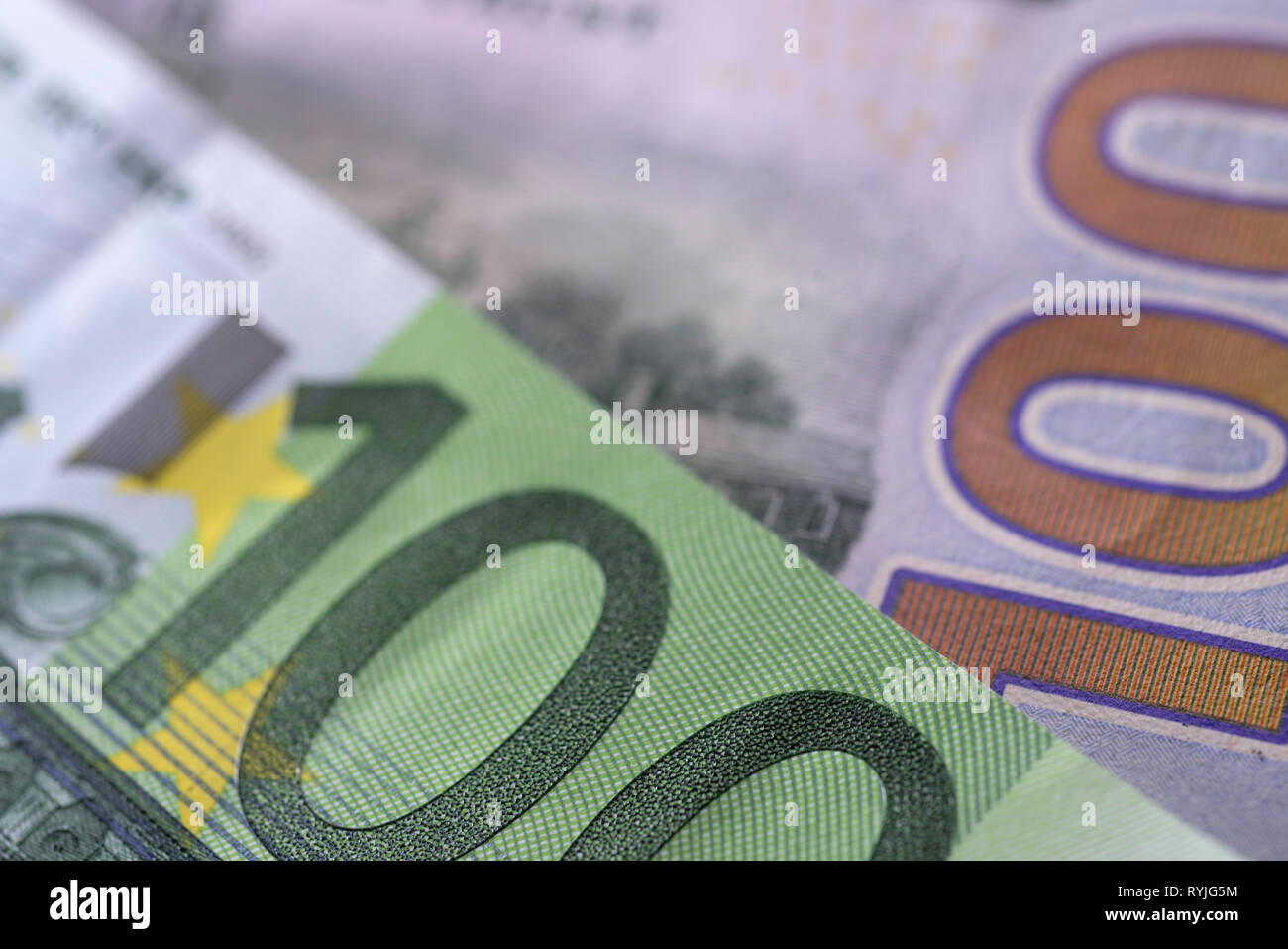 euro and us currency, one hundred bills Stock Photo