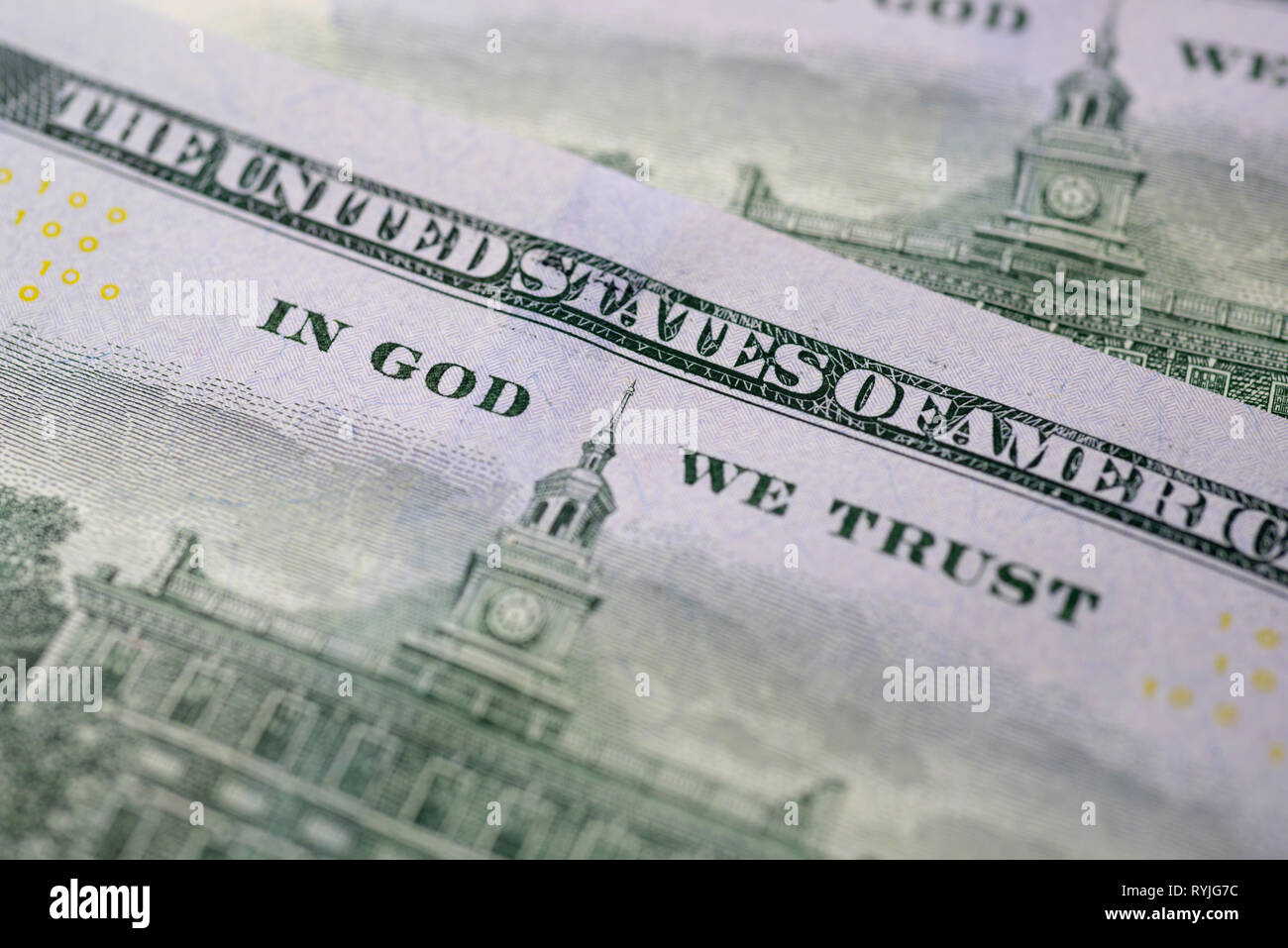 us currency one hundred dollar bills in God we trust sign Stock Photo