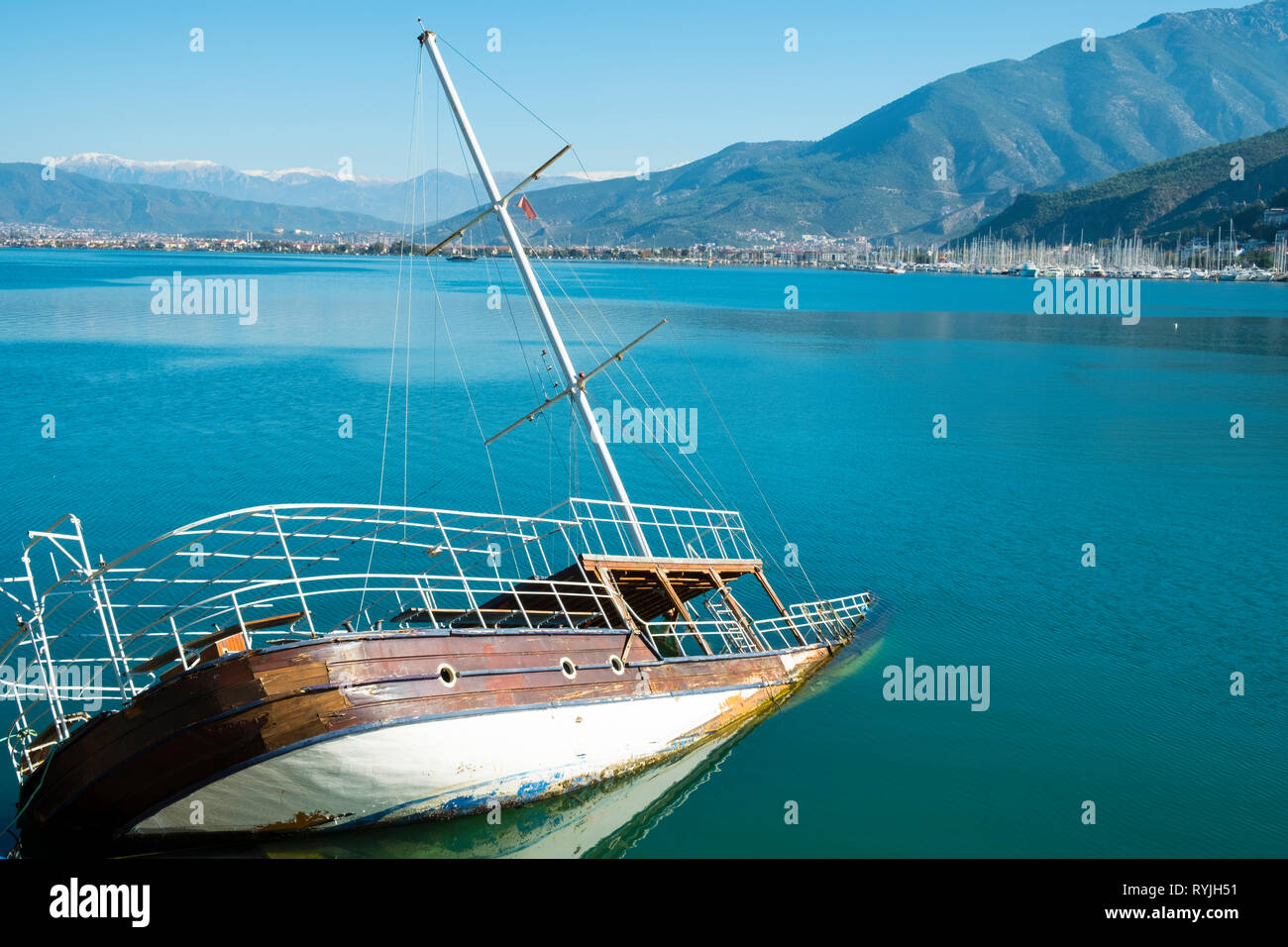 Sunken shipwreck boat in the sea off the coast of Fethiye, Turkey. Horizontal Stock Photo