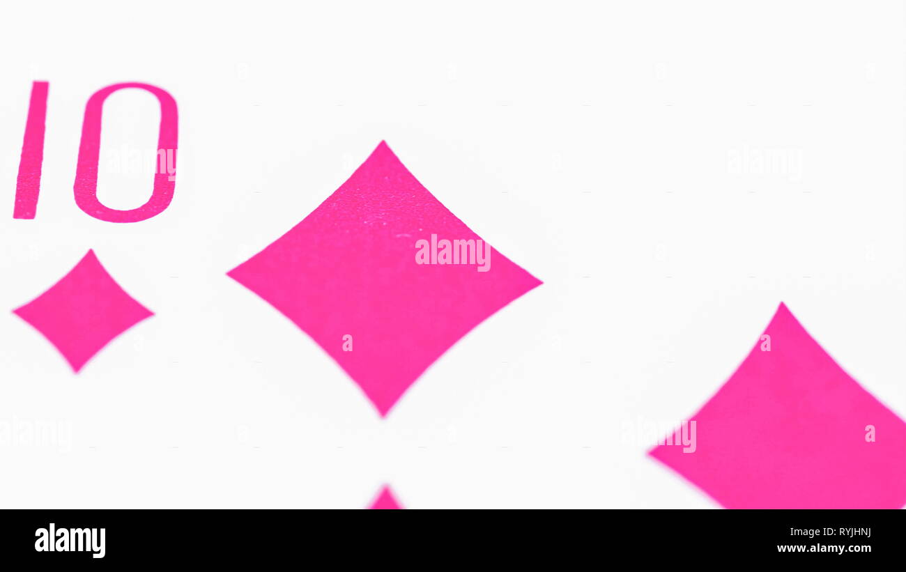 Macro shot of pink diamond on the deck of cards with the ten number on the side Stock Photo