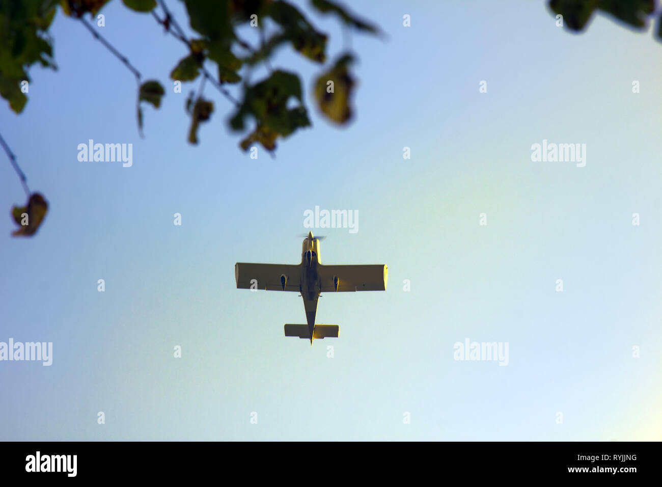 Kind Of Sports Aircraft Single Screw With Massive Wings And Changing Geometry Of Wing In Air Silhouette Of Plane View From Below Stock Photo Alamy