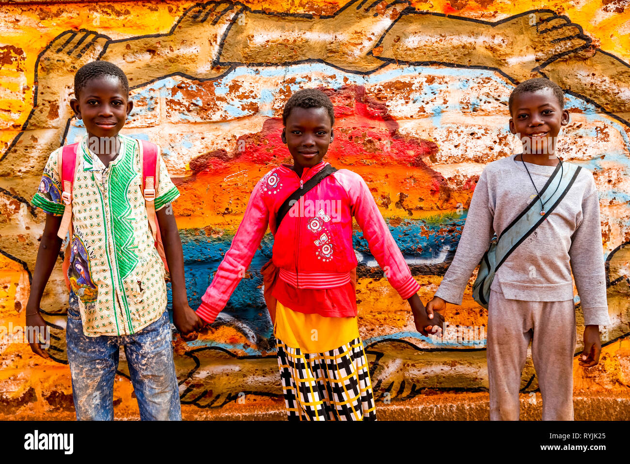 Ouahigouya children holding hands, Burkina Faso. Stock Photo
