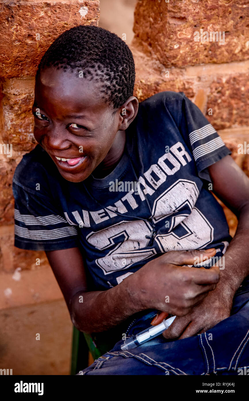 Ouagadougou boy making faces, Burkina Faso. Stock Photo
