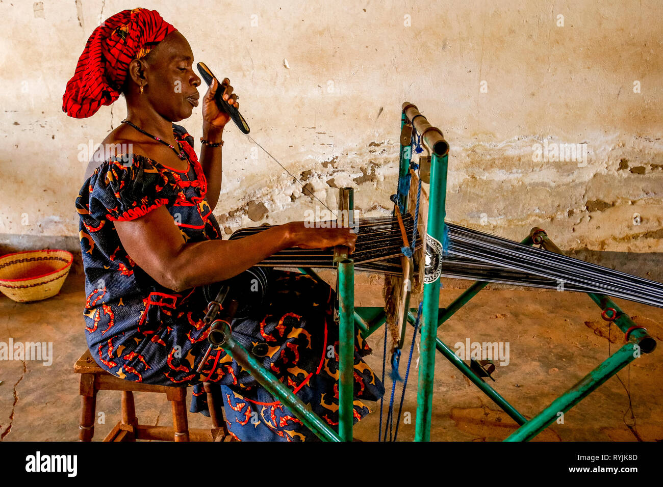 Weaver in a vocational training center in Ouahigouya, Burkina Faso. Stock Photo