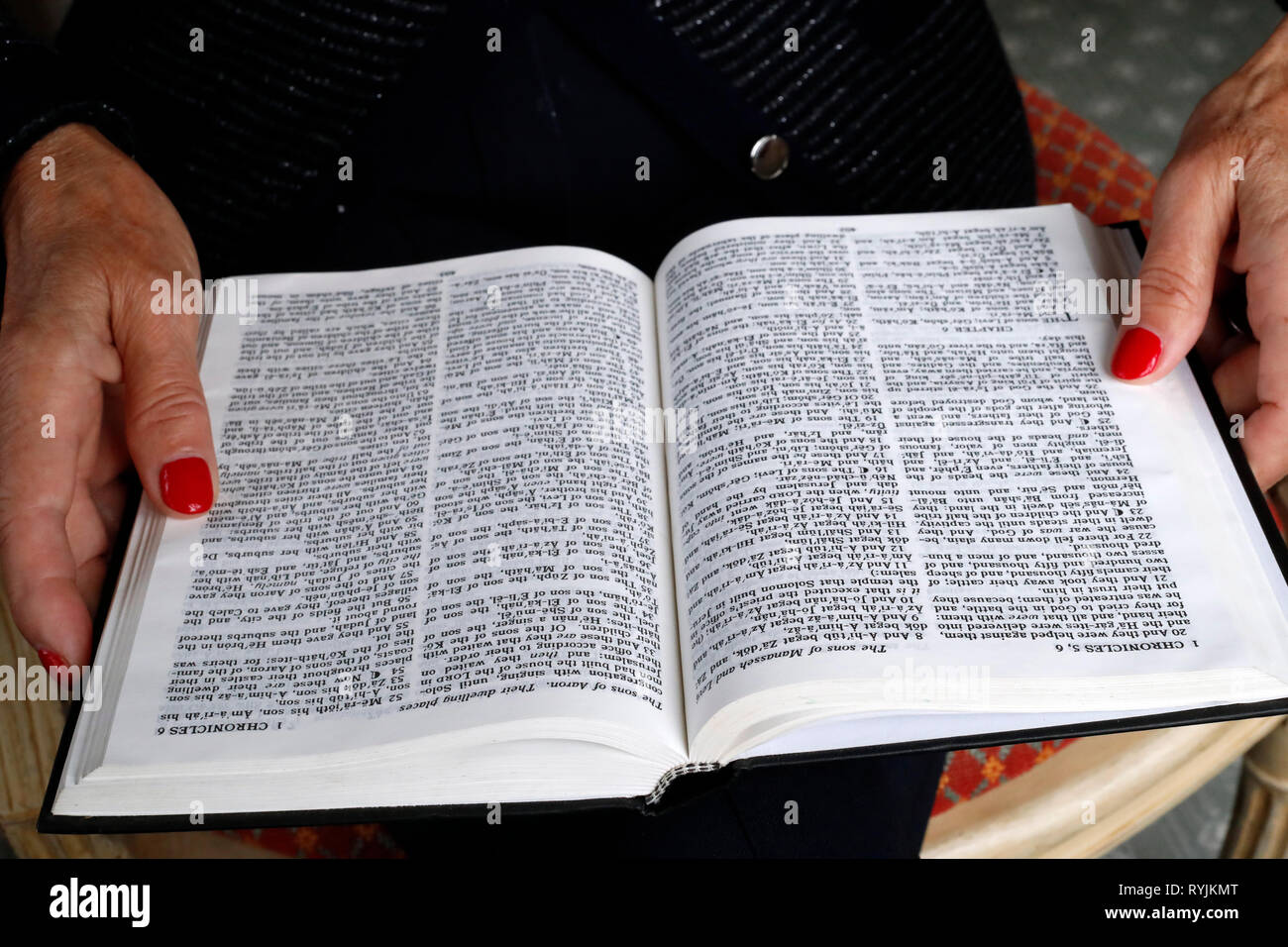 Woman reading the Bible. Close-up. Stock Photo