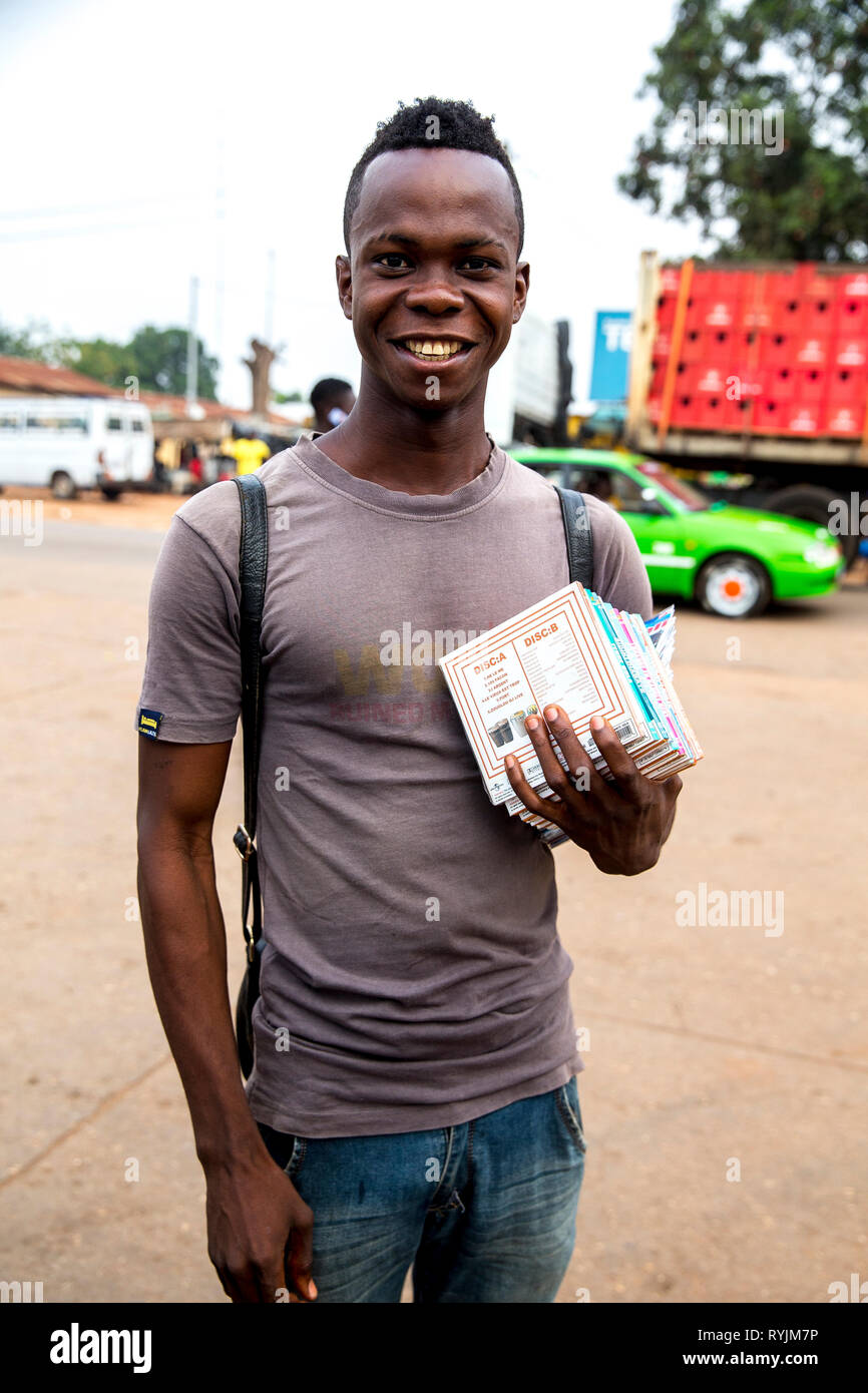 Young man selling CDs in Guezon, Ivory Coast. Stock Photo