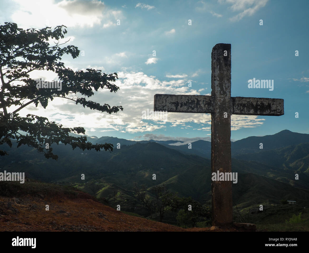 Cross and view over the Cauca valley in Colombia Stock Photo