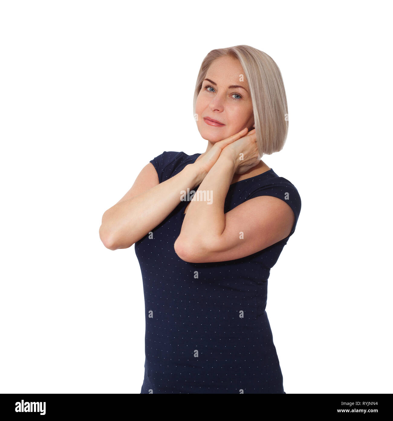 Happy woman emotionally posing in a studio. Middle aged woman on white background Stock Photo