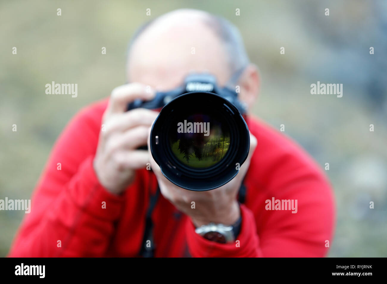 Photographer taking picture. Norway. Stock Photo