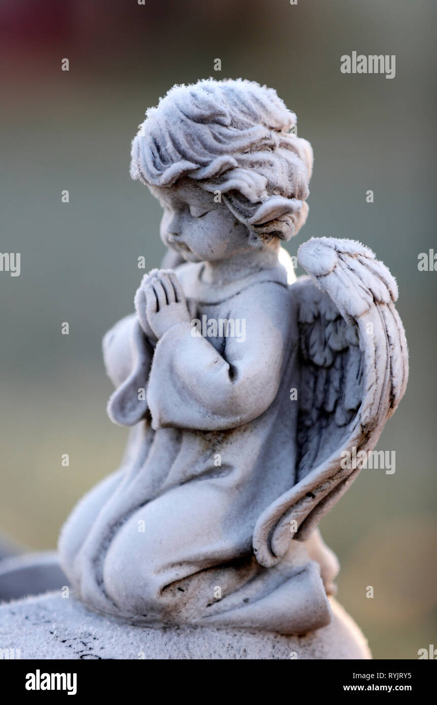 Angel statue in winter.  Cemetery.  Lundamo. Norway. Stock Photo