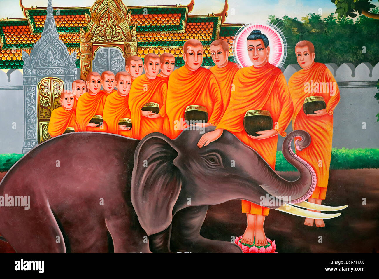 The Life of the Buddha, Siddhartha Gautama. Taming an Elephant with loving kindness - Nalagiri was the Royal Elephant Soc Po Lok buddhist temple.  Cha Stock Photo