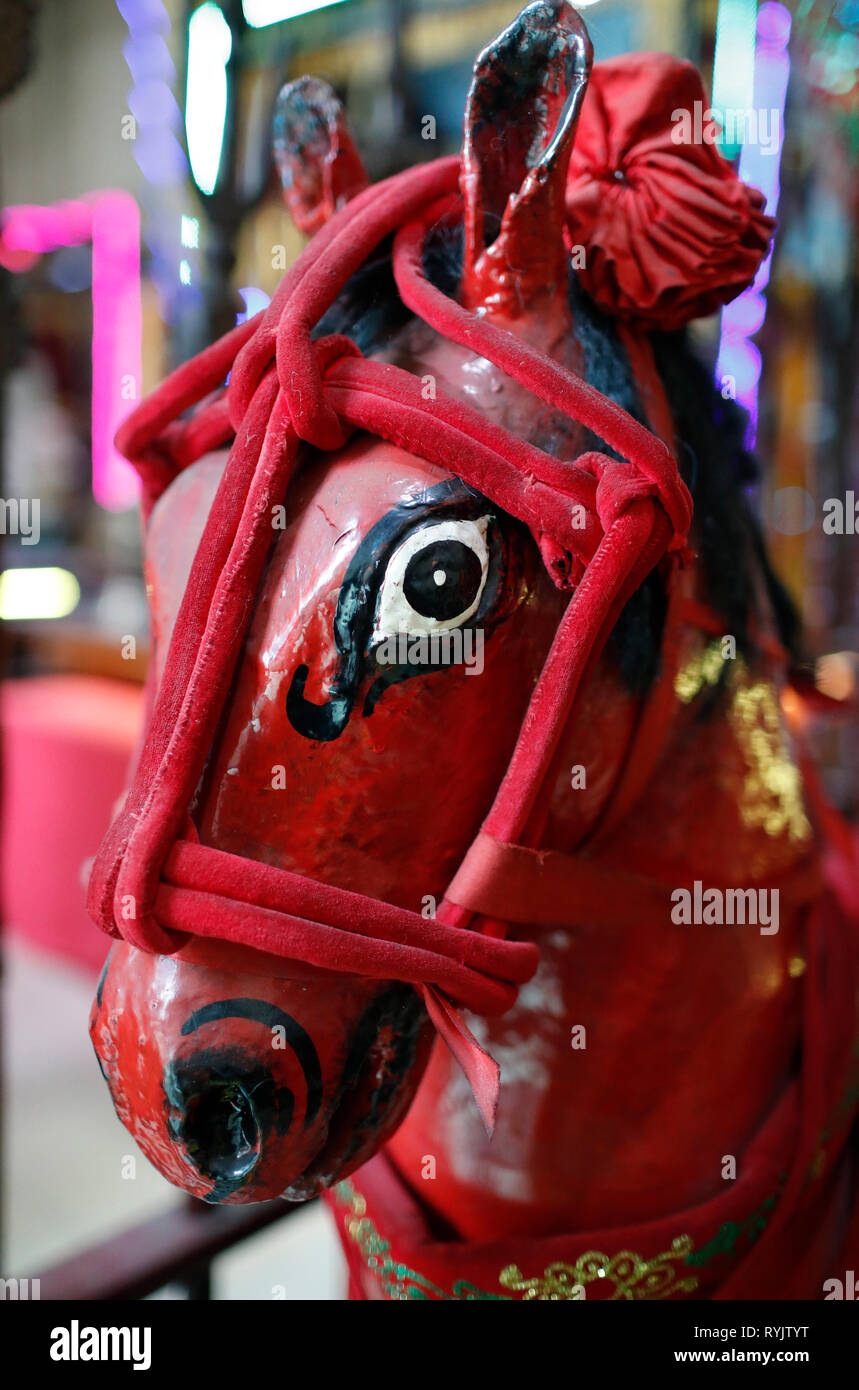 Taoist temple. Red horse statue.  Ho Chi Minh City. Vietnam. Stock Photo