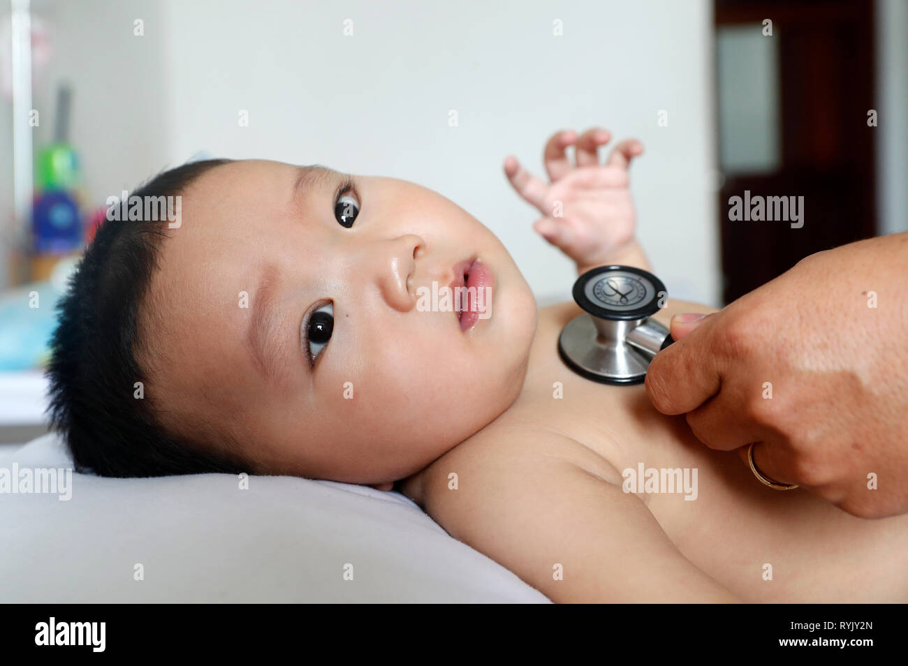 Tam Duc Cardiology Hospital. Pediatric ward.  Child suffering of heart disease. Medical consultation.  Ho Chi Minh City. Vietnam. Stock Photo