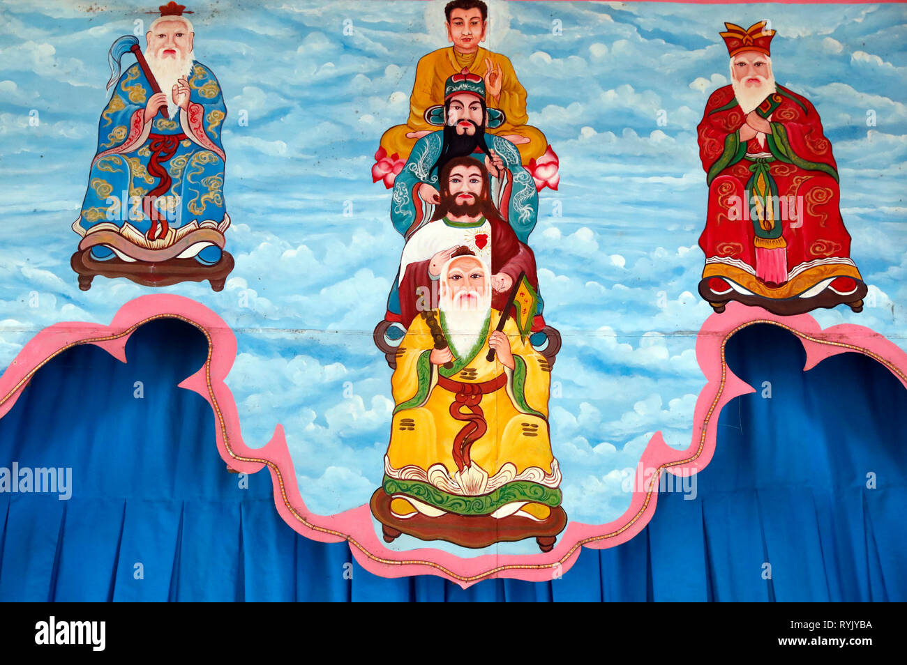 Cao Dai temple.  Lao Tseu, Jesus, Bouddha and Confucius. Interfaith. Ha Tien. Vietnam. Stock Photo
