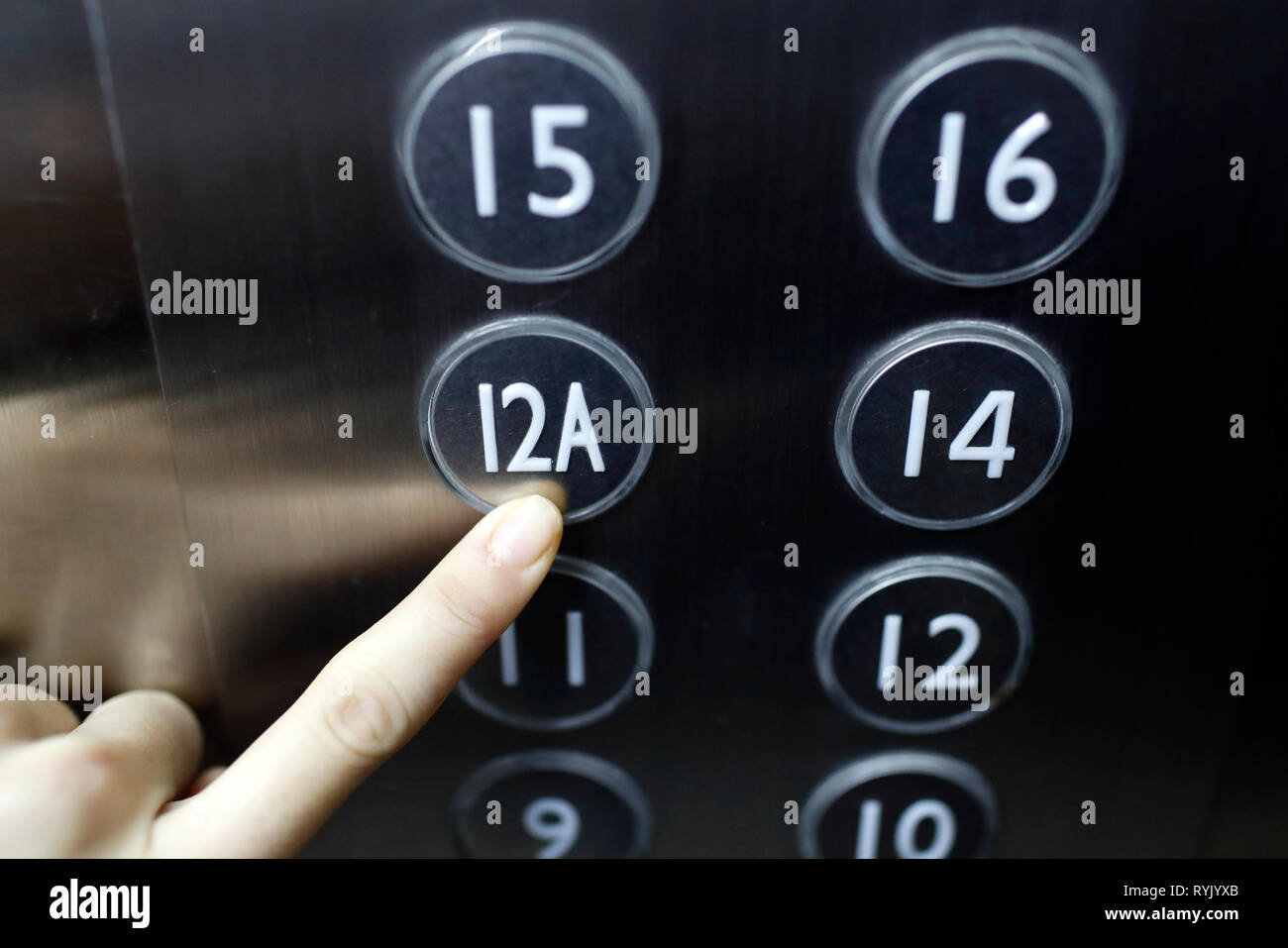 Superstition. 13 th floor missing in a new building apartment. Lift. Vung Tau. Vietnam. Stock Photo