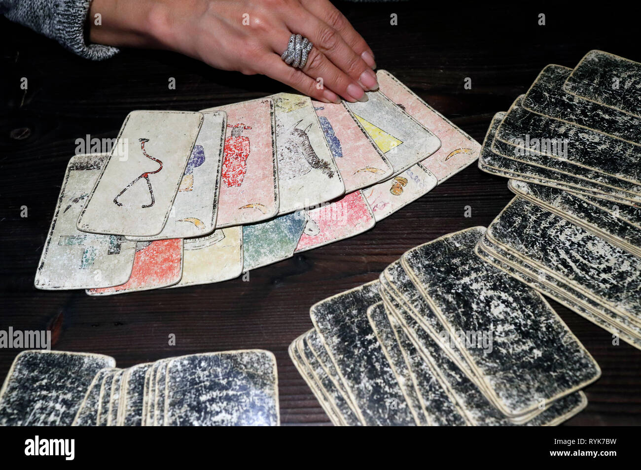 Fortuneteller Laying Cards on the Table.  France. Stock Photo
